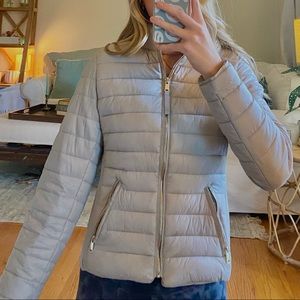 bought from a small boutique; grey, small, in perfect condition